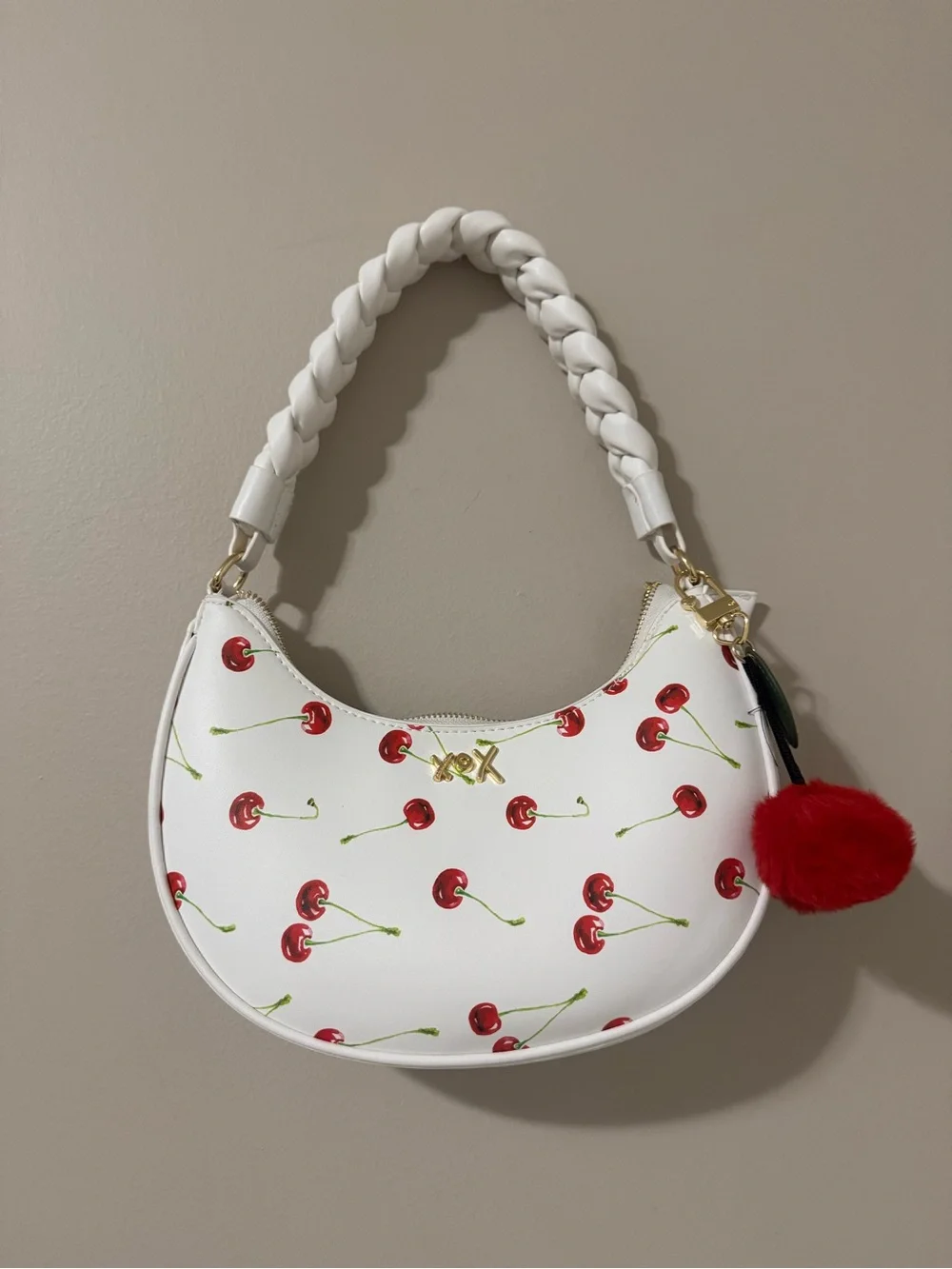 XOXO White Cherry-Print Shoulder Bag with Red Pom Charm